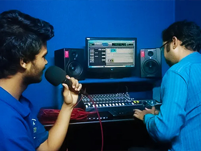 Sound engineering students working with audio equipment at MDFA